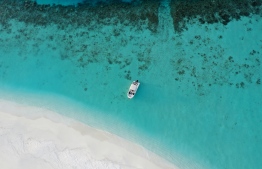 Aerial shot of a small sppedboat7 approaching a sandbank, located in Male Atoll. PHOTO: HAWWA AMAANY ABDULLA / THE EDITION