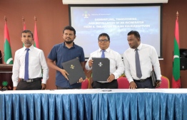Minister of Environment Dr Hassan Rasheed Hussain at the ceremony held at the ministry to award two companies with establishing incinerators on three islands. PHOTO: ENVIRONMENT MINISTRY