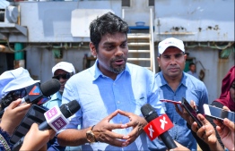 Managing Director of State Trading Orgnisation (STO) speaking to the press on a trip to Felivaru where the MIFCO fish factory is located. PHOTO: HUSSAIN WAHEED/ MIHAARU