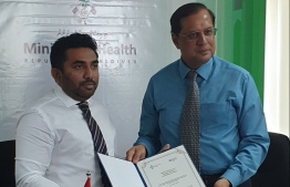 Minister of Health Abdulla Ameen and WHO Maldives' Representative Dr Arvind Mathur. PHOTO: MINISTRY OF HEALTH / TWITTER