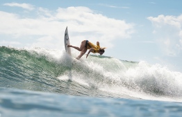 In this handout picture taken by the International Surfing Association (ISA) on September 10, 2019 South African surfer Bianca Buitendag rides a wave during the ISA World Surfing Games at Kisakihama Beach in Miyazaki. - Bianca Buitendag is one of those surfers who exudes zen-like calm and looks at one with the ocean, but qualifying for the Tokyo Olympics has left the South African completely "overwhelmed". (Photo by Ben Reed / International Surfing Association / AFP) / ---EDITORS NOTE --- RESTRICTED TO EDITORIAL USE - MANDATORY CREDIT "AFP PHOTO / INTERNATIONAL SURFING ASSOCIATION / BEN REED" - NO MARKETING - NO ADVERTISING CAMPAIGNS - DISTRIBUTED AS A SERVICE TO CLIENTS - NO ARCHIVES 
---  TO GO WITH AFP STORY "SURFING-OLY-2020-RSA-BUITENDAG" INTERVIEW BY ALASTAIR HIMMER / 
