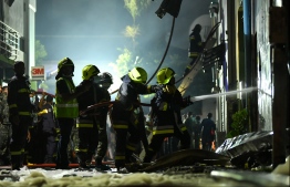 Firefighters attempt to control the unprecedented tragedy. The fire was controlled by the Maldives National Defence Force and Airport Rescue and Fire Fighting. PHOTO: HUSSAIN WAHEED / MIHAARU