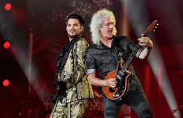 Adam Lambert and Brian May of Queen perform onstage at the 2019 Global Citizen Festival: Power The Movement in Central Park in New York on September 28, 2019. (Photo by Angela Weiss / AFP)