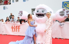 (FILES) In this file photo taken on September 7, 2019 Chloe Bennet and Sarah Paulson attend the "Abominable" premiere during the 2019 Toronto International Film Festival at Roy Thomson Hall  in Toronto, Canada. - "Abominable" froze out "Downton Abbey" to take the top spot in the North American box office on its first weekend in theaters, industry watcher Exhibitor Relations estimated on September 29, 2019. The story of a teenager and her friends working to help a young Yeti -- whom they nickname Everest -- reunite with his family and avoid the clutches of a wealthy man intent on capturing one of the magical creatures took in $20.9 million. (Photo by Phillip Faraone / GETTY IMAGES NORTH AMERICA / AFP)