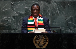 President of Zimbabwe Emmerson Dambudzo Mnangagwa speaks at the 74th Session of the General Assembly at the United Nations headquarters on September 25, 2019 in New York. (Photo by Johannes EISELE / AFP)