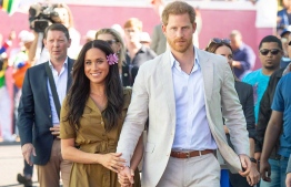 Prince Harry and Meghan Markle, who formally stepped down as senior members of the British royal family, have relocated to Los Angeles, California. PHOTO: AFP