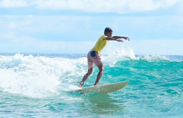 A surfer at the 3rd Soneva Surf Pro Competition, hosted in Baa Atoll this year. PHOTO: HAWWA AMAANY ABDULLA / THE EDITION