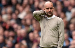 Manchester City's Spanish manager Pep Guardiola watches his players from the touchline during the English Premier League football match between Manchester City and Wolverhampton Wanderers at the Etihad Stadium in Manchester, north-west England, on October 6, 2019. PHOTO: OLI SCARFF / AFP