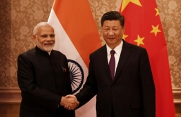 Indian Prime Minister Narendra Modi and Chinese President Xi Jinping. PHOTO: AFP