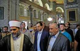 A Saudi football delegation visited east Jerusalem's Al-Aqsa mosque on October 14, 2019, on the eve of a groundbreaking trip to play a match against Palestinians in the occupied West Bank PHOTO: AHMAD GHARABLI / AFP