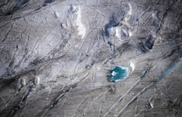 (FILES) In this file photo taken on October 01, 2019 This picture taken on October 01, 2019 shows the surface of Aletsch glacier above Bettmeralp, Swiss Alps. - The mighty Aletsch -- the largest glacier in the Alps -- could completely disappear by the end of this century if nothing is done to rein in climate change, a study showed on September 12, 2019 by ETH technical university in Zurich. (Photo by Fabrice COFFRINI / AFP)