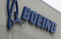 (FILES) In this file photo taken on March 12, 2019 the Boeing logo is pictured at the Boeing Renton Factory in Renton, Washington. (Photo by Jason Redmond / AFP)