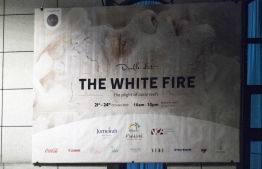 The exhibition banner of Azmeel's 'The White Fire: The plight of coral reefs' outside the National Art Gallery. PHOTO: AHMED AIHAM / THE EDITION