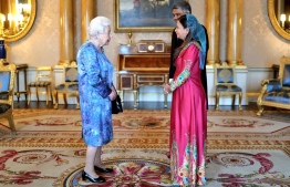 Ambassador of the Maldives to the United Kingdom, Dr Farah Faizal (R), presents her Letters of Credence to Queen Elizabeth II, at Buckingham Palace on October 29, 2019. PHOTO/FOREIGN MINISTRY