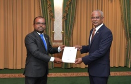 President Ibrahim Mohamed Solih appoints Hussain Fiyaz Moosa as the Information Commissioner. PHOTO/PRESIDENT'S OFFICE