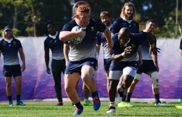 South Africa's prop Steven Kitshoff (L) and hooker Mbongeni Mbonambi (R) take part in a team training session at the Arcs Urayasu Park in Urayasu near Tokyo on November 1, 2019, ahead of their final against England on November 2 in the Japan 2019 Rugby World Cup. (Photo by CHARLY TRIBALLEAU / AFP)