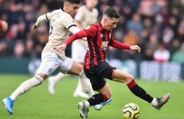 Bournemouth's Welsh midfielder Harry Wilson (R) takes on Manchester United's Belgian-born Brazilian midfielder Andreas Pereira (L) during the English Premier League football match between Bournemouth and Manchester United at the Vitality Stadium in Bournemouth, southern England on November 2, 2019. (Photo by Glyn KIRK / AFP) / RESTRICTED TO EDITORIAL USE. No use with unauthorized audio, video, data, fixture lists, club/league logos or 'live' services. Online in-match use limited to 120 images. An additional 40 images may be used in extra time. No video emulation. Social media in-match use limited to 120 images. An additional 40 images may be used in extra time. No use in betting publications, games or single club/league/player publications. / 