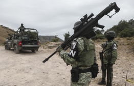Members of the National Guard patrol the Sonora mountain range, where nine members of the LeBaron community were killed on Monday in the municipality of Bavispe, Sonora state, Mexico, on November 8, 2019. - The attack happened on an isolated dirt road in a region known for turf wars between drug cartels fighting over lucrative trafficking routes to the United States. (Photo by Herika Martinez / AFP)