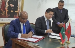 Minister of Foreign Affairs Abdulla Shahid signing the visa waiver agreement. PHOTO: MISTRY OF FOREIGN AFFAIRS