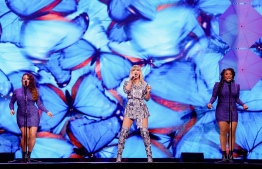 US singer Taylor Swift (C) performs during the 2019 Tmall 11:11 Global Shopping Festival gala in Shanghai on November 10, 2019. (Photo by STR / AFP) / 
