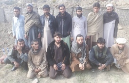 PHOTO: Some of the insurgents that surrendered in Afgnistan's Nangarhar province. AJHWOK AFGHAN NEWS