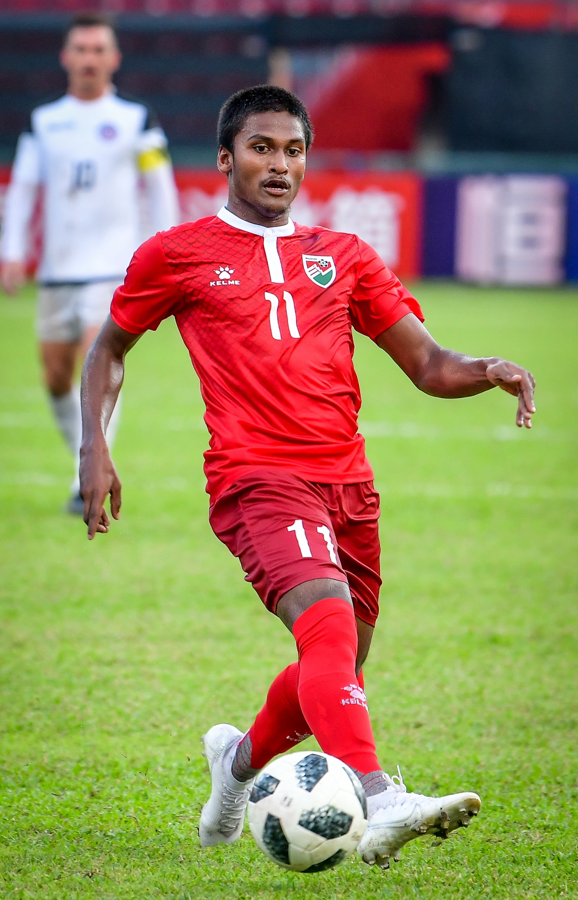 މާލެ: 19 ނޮވެމްބަރ 2019: ވޯލްޑް ކަޕް ކޮލިފައިންގައި ދިވެހިރާއްޖެ އާއި ގުއާމް ބައްދަލުކުރި މެޗުގެ ތެރެއިން: 3-1 އިން ގުއާމް ބަލިކޮށް ރާއްޖޭ ވަނީ އޭޝިއަން ކަޕް ކޮލިފައިންގެ ތިން ވަނަ ބުރުން ސީދާ ޖާގައެއް ހޯދުމުގެ އުއްމީދު އާކޮށްފައި. -ފޮޓޯ:ނިޝާން އަލީ /މިހާރު