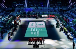 The teams pose on the court during the opening ceremony of the Davis Cup Madrid Finals 2019 in Madrid on November 18, 2019. (Photo by JAVIER SORIANO / AFP)
