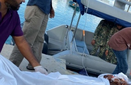 Coast guard transporting the man who was stabbed from AA.Maalhos. PHOTO: MNDF
