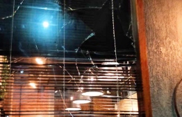 The damaged glass window of Meraki Coffee Roasters. PHOTO: SOCIAL MEDIA