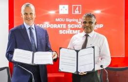 BML's CEO and Managing Director Tim Sawyer (L) and Higher Education Minister Dr Ibrahim Hassan sign MOU for Corporate Scholarship Scheme on November 28, 2019. PHOTO/BML