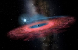 This handout received from the Beijing Planetarium via the China Academy of Sciences on November 26, 2019 shows a rendering by artist Yu Jingchuan of the accretion of gas onto a stellar black hole from its blue companion star, through a truncated accretion disk. - Astronomers have discovered a black hole in the Milky Way so huge that it challenges existing models of how stars evolve, researchers announced on November 28. (Photo by Yu Jingchuan / Beijing Planetarium via the China Academy of Sciences / AFP) / -----EDITORS NOTE --- RESTRICTED TO EDITORIAL USE - MANDATORY CREDIT "AFP PHOTO / Yu Jingchuan / Beijing Planetarium via the China Academy of Sciences" - NO MARKETING - NO ADVERTISING CAMPAIGNS - DISTRIBUTED AS A SERVICE TO CLIENTS  - NO ARCHIVES / 