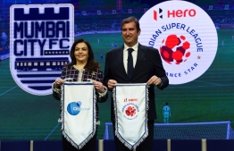 English Premier League football club Manchester City and City Football Group (CFG) CEO Ferran Soriano  (R) and India's Football Sports Development Ltd chairperson Nita Ambani attend an event in Mumbai on November 28, 2019. - The owners of English Premier League champions Manchester City on Thursday made Mumbai City FC of India the eighth club in their global football empire. (Photo by INDRANIL MUKHERJEE / AFP)