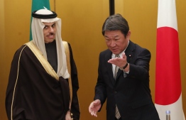 Japan's Foreign Minister Toshimitsu Motegi (R) meets with Saudi Arabia's Foreign Minister Prince Faisal bin Farhan at the G20 Foreign Ministers meeting in Nagoya on November 22, 2019. (Photo by KIM KYUNG-HOON / POOL / AFP)