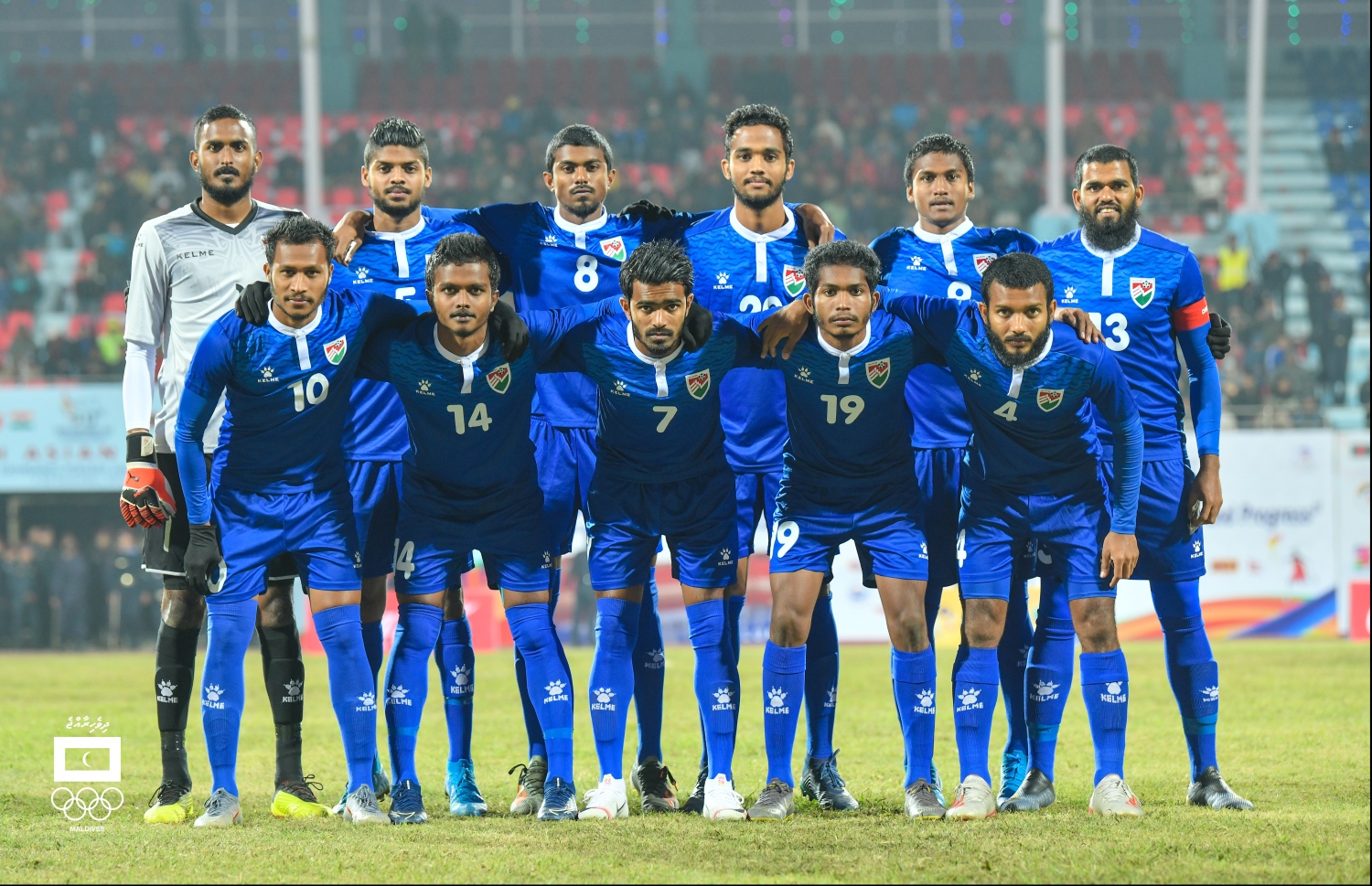 މިއަދުގެ މެޗަށް ނުކުތް ރާއްޖޭގެ ފުރަތަމަ އެގާރަ ކުޅުންތެރިން.-- ފޮޓޯ: ހުސެއިން ވަހީދު/ މޯލްޑިވްސް އޮލިމްޕިކް ކޮމިޓީ