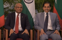 President Ibrahim Mohamed Solih (L) and Indian High Commissioner Sunjay Sudhir. FILE PHOTO: NISHAN ALI / MIHAARU