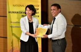 Minister of Planning and Infrastructure Mohamed Aslam (R) and UNDP Resident Representative to Maldives Akiko Fujii during the national launch of the global Human Development Report 2019 by the United Nations Development Programme. PHOTO: NISHAN ALI / MIHAARU