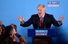 Britain's Prime Minister and leader of the Conservative Party, Boris Johnson speaks during a campaign event to celebrate the result of the General Election, in central London on December 13, 2019. - Prime Minister Boris Johnson on Friday hailed a political "earthquake" after securing a sweeping election win, which clears the way for Britain to finally leave the European Union next month after years of political deadlock. (Photo by DANIEL LEAL-OLIVAS / AFP)