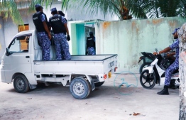 Officers from Maldives Police Service in Maduvvari, Raa Atoll, inspecting houses under operation 'Asseyri'. PHOTO: MADUVVARI ONLINE