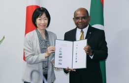 Ambassador of Japan to Maldives Keiko Yanai (L) presents the list of equipment to be provided to Maldives under the Exchange of Notes signed between Japan and Maldives in October 2019, to Foreign Minister Abdulla Shahid. PHOTO/FOREIGN MINISTRY
