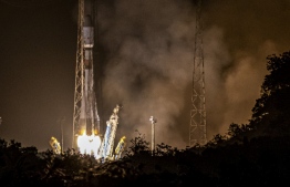 A Soyouz rocket lift-off from Europe's launchpad in Kourou, French Guiana, on December 18, 2019, with Europe's CHEOPS planet-hunting satellite on board. - The 30-centimetre (12-inch) telescope has been designed to measure the density, composition, and size of numerous planets beyond our solar system, so-called exoplanets. According to the European Space Agency (ESA), CHEOPS will observe bright stars that are already known to be orbited by planets. (Photo by jody amiet / AFP)