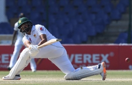 Pakistan's Azhar Ali plays a shot during the fourth day of the second Test cricket match between Pakistan and Sri Lanka at the National Cricket Stadium in Karachi on December 22, 2019. (Photo by ASIF HASSAN / AFP)