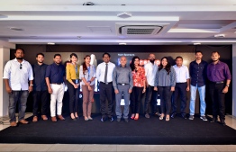 Mihaaru's Editor Moosa Latheef (C) and representatives of Mihaaru Awards 2019's partners and sponsors pose for a photograph after the signing ceremony on December 22, 2019. PHOTO: NISHAN ALI / MIHAARU
