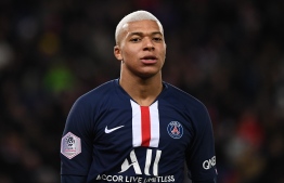 Paris Saint-Germain's French forward Kylian Mbappe reacts  during the French L1 football match between Paris Saint-Germain (PSG) and Amiens at the Parc des Princes stadium in Paris on December 21, 2019. (Photo by FRANCK FIFE / AFP)