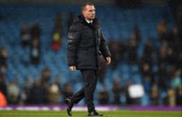 Leicester City's Northern Irish manager Brendan Rodgers reacts to their defeat on the pitch after the English Premier League football match between Manchester City and Leicester City at the Etihad Stadium in Manchester, north west England, on December 21, 2019. - Manchester City won the game 3-1. (Photo by Oli SCARFF / AFP) / RESTRICTED TO EDITORIAL USE. No use with unauthorized audio, video, data, fixture lists, club/league logos or 'live' services. Online in-match use limited to 120 images. An additional 40 images may be used in extra time. No video emulation. Social media in-match use limited to 120 images. An additional 40 images may be used in extra time. No use in betting publications, games or single club/league/player publications. / 
