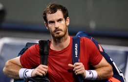 (FILES) In this file photo Andy Murray of Britain leaves the court after losing against Fabio Fognini of Italy in their men's singles match at the Shanghai Masters tennis tournament in Shanghai on October 8, 2019. - Andy Murray has been ruled out of next month's Australian Open with a pelvic injury, it was announced on Saturday.
The 32-year-old Scot suffered a pelvic problem playing for Great Britain in the Davis Cup last month and his agent, Matt Gentry, said the injury "hasn't cleared up as quickly as hoped". (Photo by Noel CELIS / AFP)