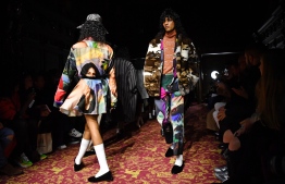 Models present creations from the Edward Crutchley collection during a catwalk show on the first day of the Autumn/Winter 2020 London Fashion Week Men's, in London on January 4, 2020.
Ben STANSALL / AFP