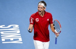 Dominic Thiem of Austria celebrates victory in his men's singles match against Diego Schwartzman of Argentina at the ATP Cup tennis tournament in Sydney on January 6, 2020. (Photo by William WEST / AFP) / 