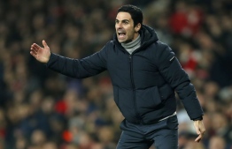 Arsenal's Spanish head coach Mikel Arteta gestures on the touchline during the English Premier League football match between Arsenal and Manchester United at the Emirates Stadium in London on January 1, 2020. (Photo by Ian KINGTON / IKIMAGES / AFP) / 