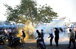 Police violently crackdown on thousands who took to the streets on 8 February 2012, in a show of protest over the ousting of former President Mohamed Nasheed. PHOTO: MIHAARU