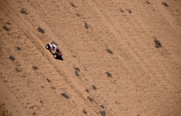 Mini's Spanish drivers Carlos Sainz of Spain and co-driver Lucas Cruz of Spain compete during the Stage 5 of the Dakar 2020 between Al Ula and Ha'il, Saudi Arabia, on January 9, 2020. (Photo by FRANCK FIFE / AFP)